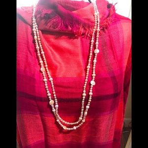 Women’s pearl look necklace. 20” long doubled